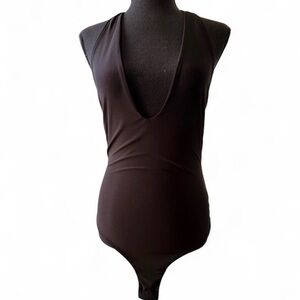 Black halter neck bodycon  with a low back #bodycon #halterneck #dress